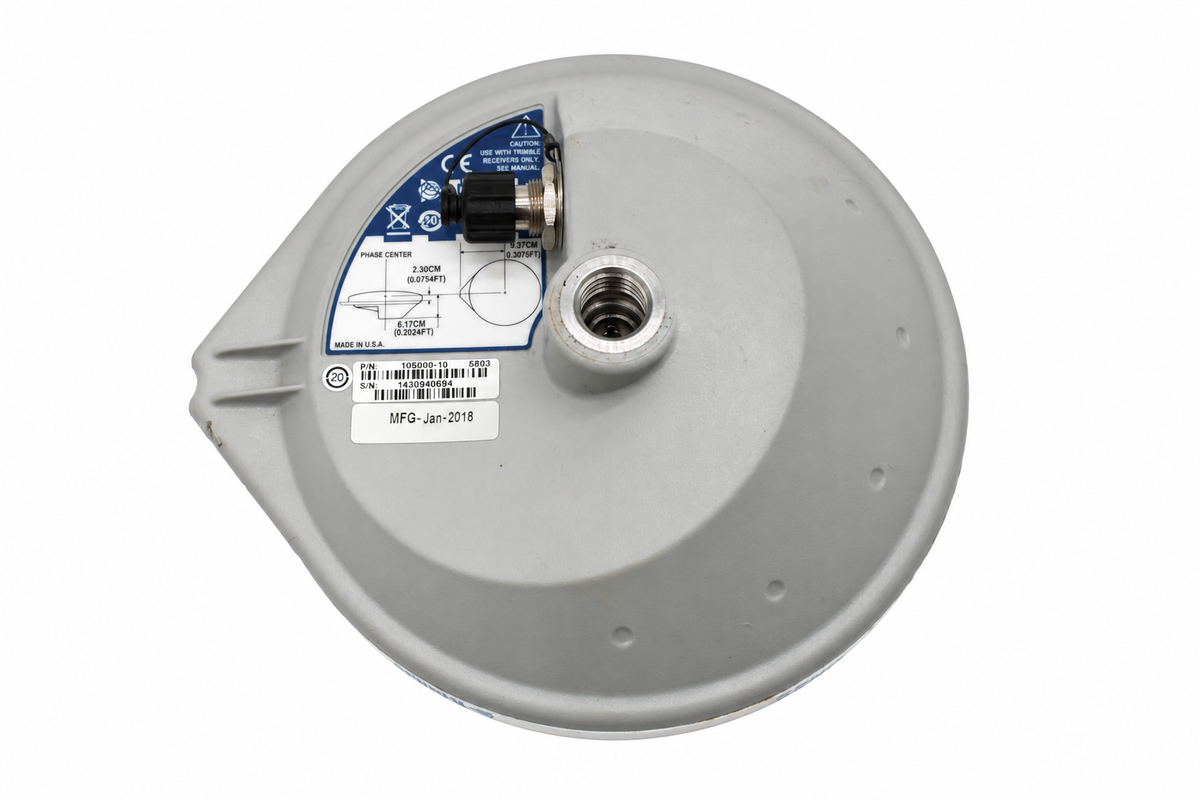 Used Trimble Zephyr Model 3 Rover GNSS antenna, underside showing the identification labels, threaded mount and capped connector.