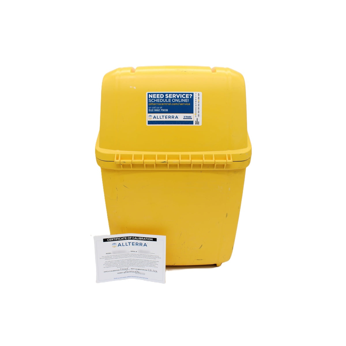 Trimble rugged transport case with calibration certificate; model and serial number obscured