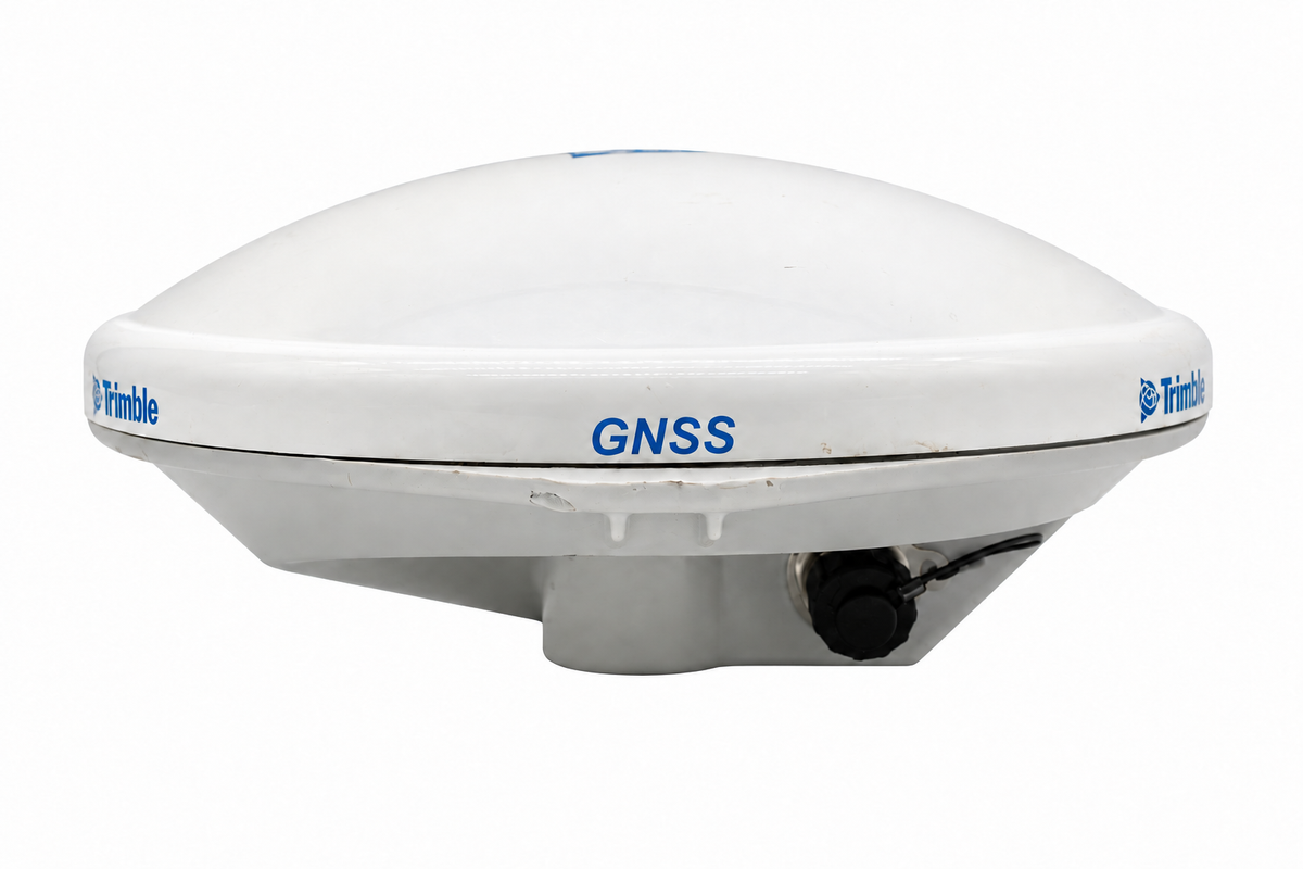 Used Trimble Zephyr Model 3 Rover GNSS antenna, side view showing the dome, branding and connector cap.