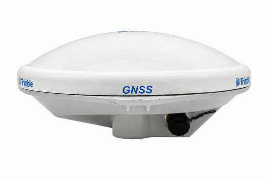 Used Trimble Zephyr Model 3 Rover GNSS antenna, side view showing the dome, branding and connector cap.