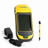 Used Trimble Geo 7X Centimeter handheld with stylus and charger on a white background
